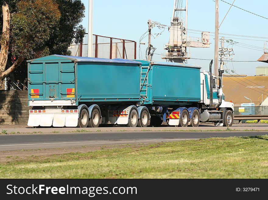 Heavy articulated semi truck on road