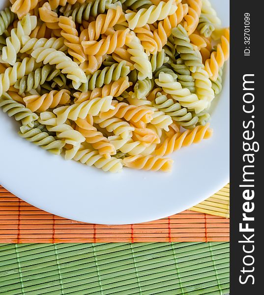 Traditional italian fusilli pasta in the plate