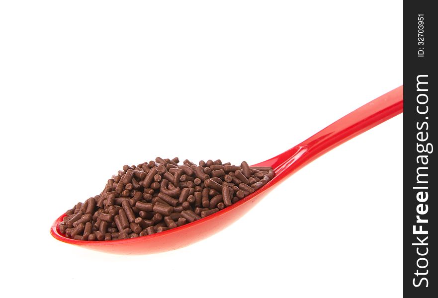 Chocolate on the red spoon