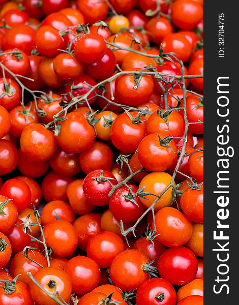 Ripe tomatoes, close-up, vertical