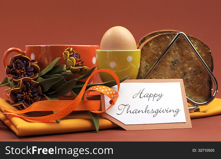 Happy Thanksgiving breakfast for your special one with toast and egg with coffee or tea in an orange polka dot cup and saucer, with heartfelt gift tag. Happy Thanksgiving breakfast for your special one with toast and egg with coffee or tea in an orange polka dot cup and saucer, with heartfelt gift tag.