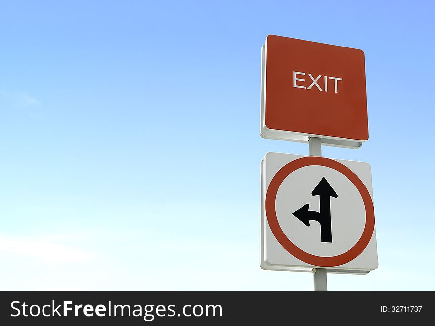 Red and white square traffic sign up in clear blue sky