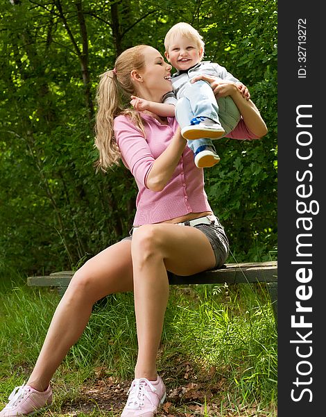 Mother And Child On A Bench