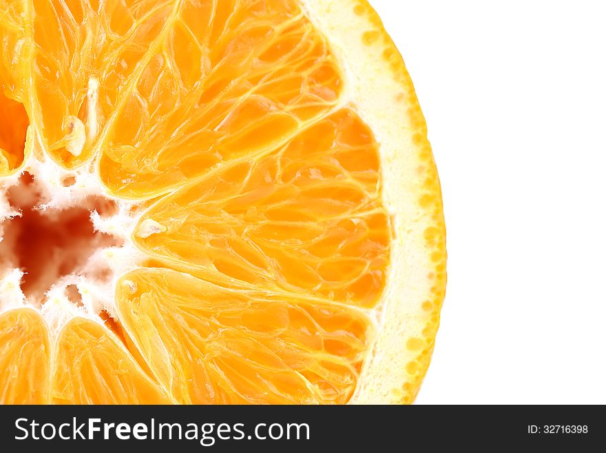 Slice of fresh orange and a half white background