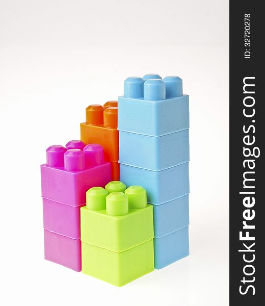 Colorful tower brick toy on white background