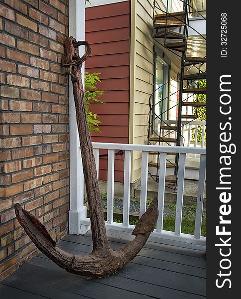 Rusted anchor on a front porch