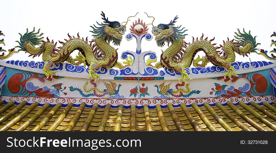 Colorful dragon statue on roof of temple, si chang island, Thailand