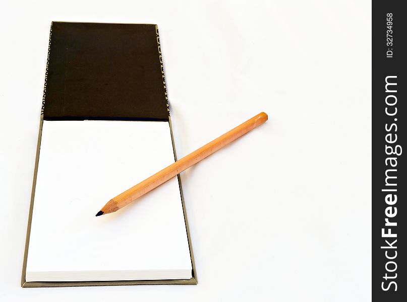 A pencil and notebook