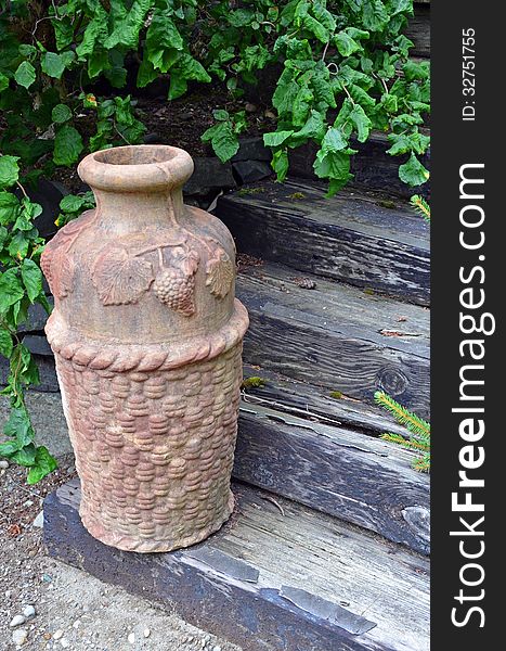 Decorative urn on wooden stairs