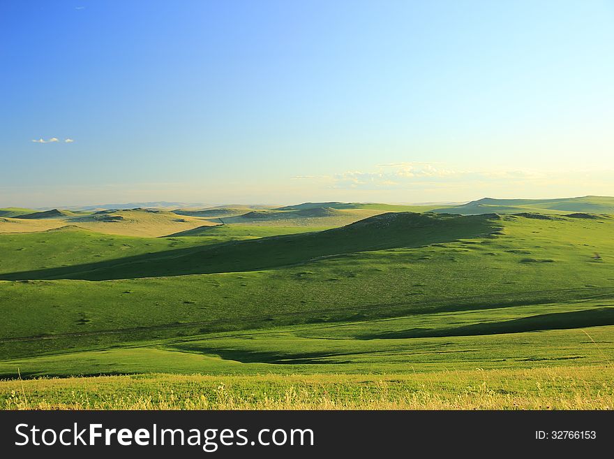 Expanse steppe Zabaykalskie impossible to embrace eyes. Photographed with one of the hills in the before sunset time. Expanse steppe Zabaykalskie impossible to embrace eyes. Photographed with one of the hills in the before sunset time