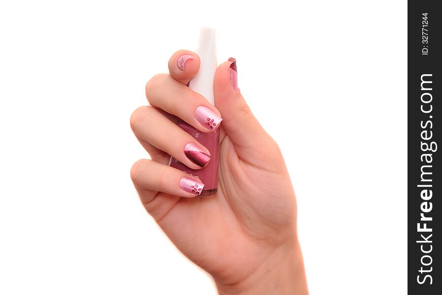 Woman's hand holding nail polish bottle. Woman's hand holding nail polish bottle