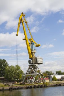 Crane Loading Cargo In The River Port Royalty Free Stock Images Crane Loading Cargo In The River Port Royalty Free Stock Images