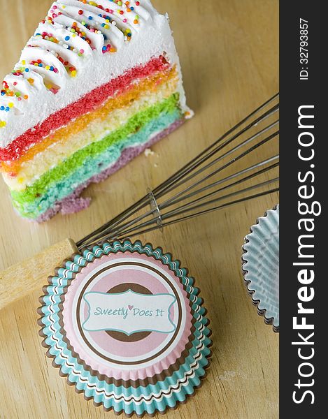 Sweet color cake with tools for bakery. Sweet color cake with tools for bakery