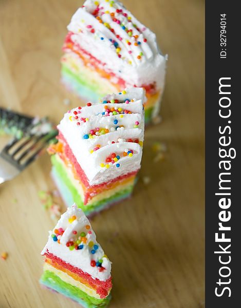 Top view of pieces rainbow cake. Top view of pieces rainbow cake