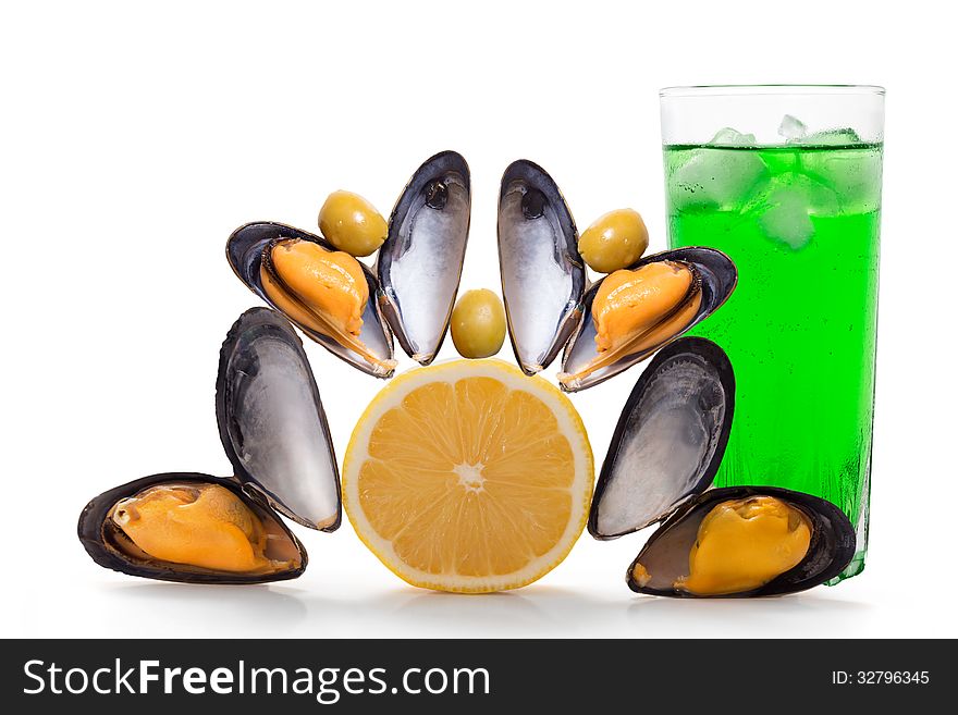 Mussels with lemon, olives and cocktail with ice. Mussels with lemon, olives and cocktail with ice