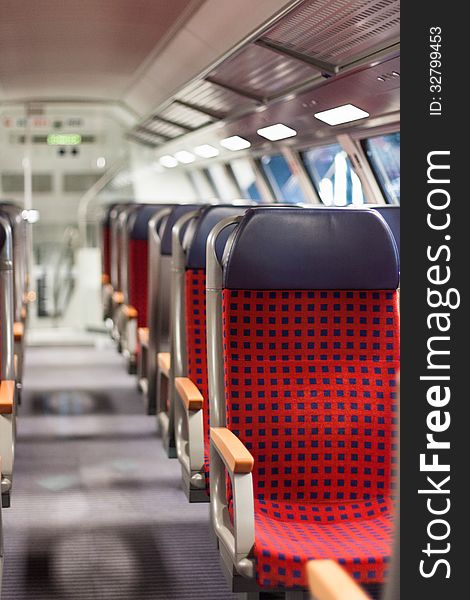 View of vacant seats inside a train. View of vacant seats inside a train