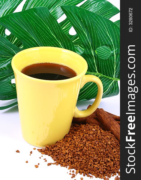 Cup of coffee with coffee grain