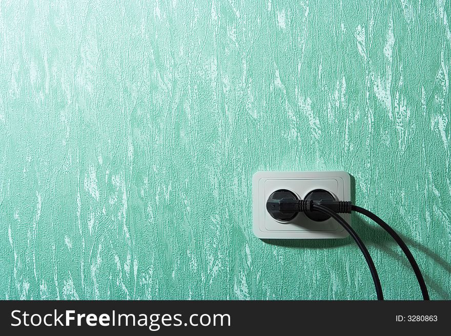 Wall outlets on the green wall