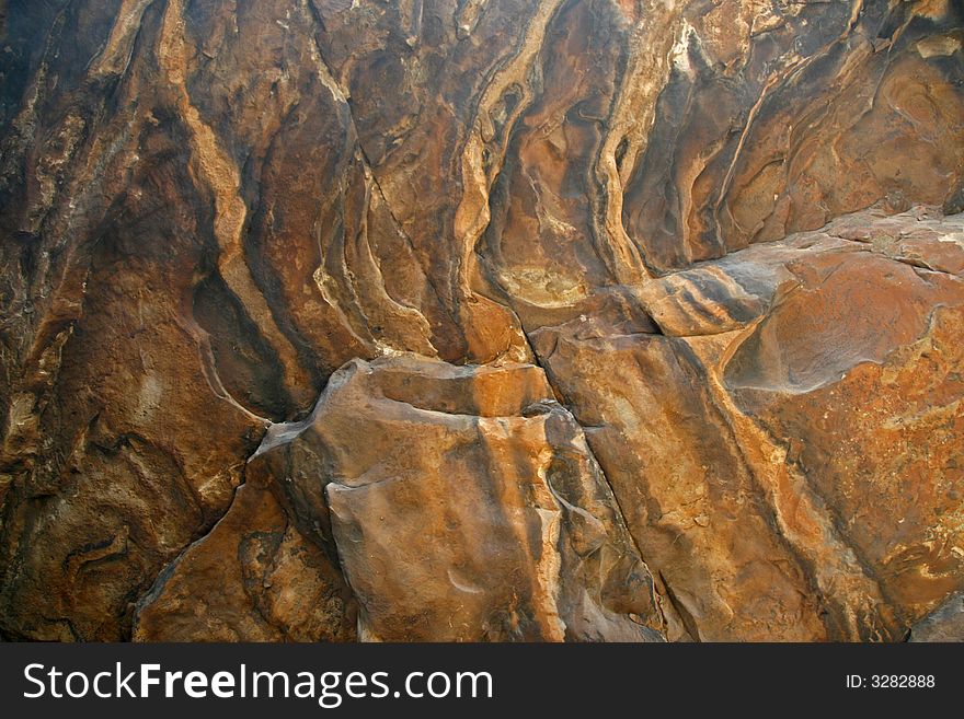 Close-up of sandstone cave ceiling. Background or wallpaper. Close-up of sandstone cave ceiling. Background or wallpaper.
