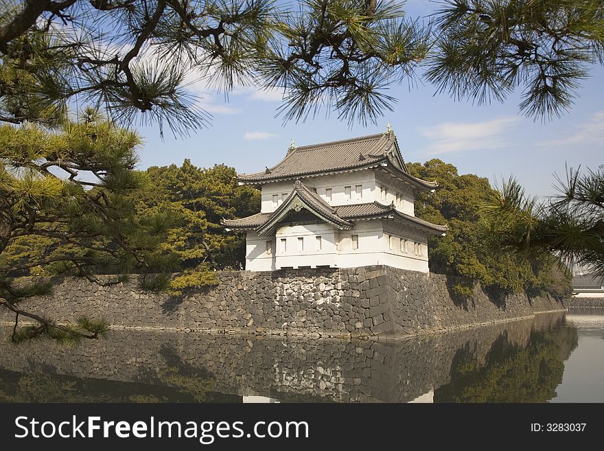 An government castle surrounded by a mote in Tokyo. An government castle surrounded by a mote in Tokyo