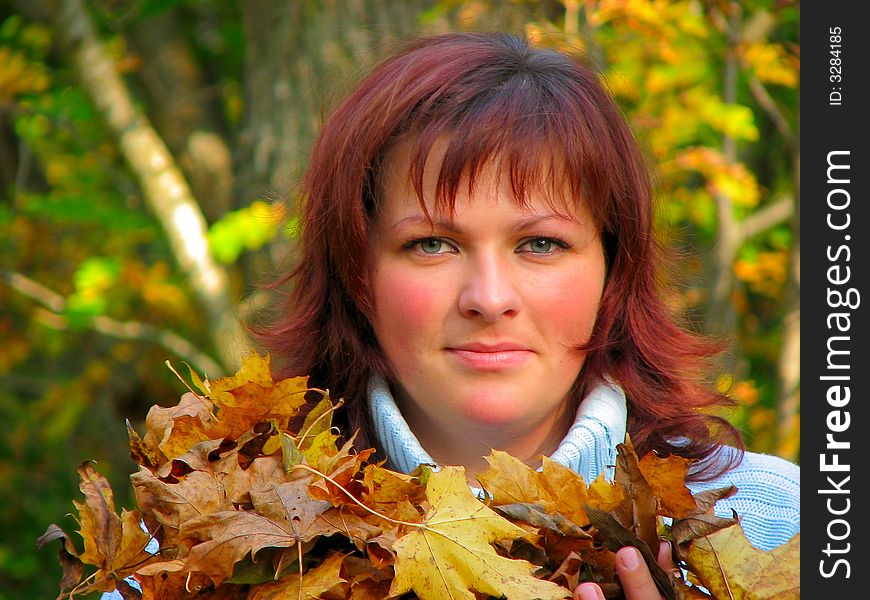 Woman With Autumn Leaves