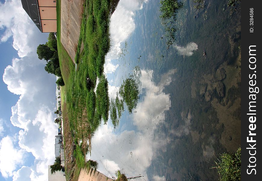 Magnificent clouds reflected in a local creek.  Taken in Austin, Texas. Magnificent clouds reflected in a local creek.  Taken in Austin, Texas.