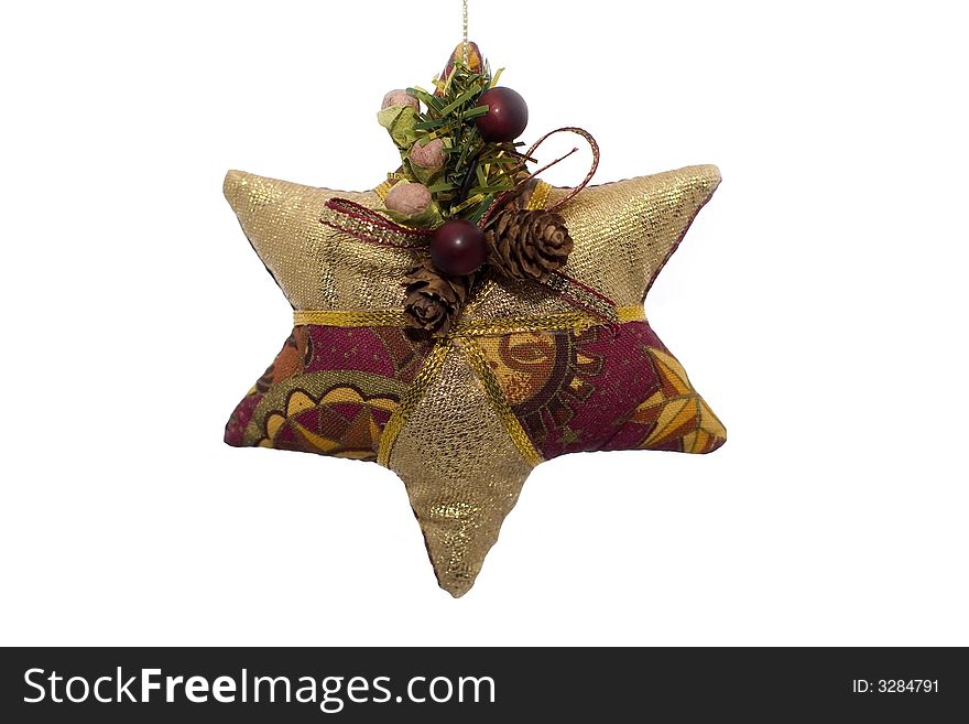 A fabric christmas ornament shaped like a star on a white background. A fabric christmas ornament shaped like a star on a white background