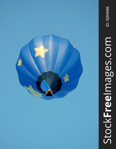 Floating blue hot air balloon with stars. Floating blue hot air balloon with stars