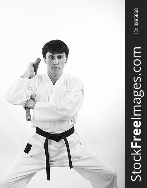 Portrait of a styled professional model. Theme: sport oriental martial art. Portrait of a styled professional model. Theme: sport oriental martial art.