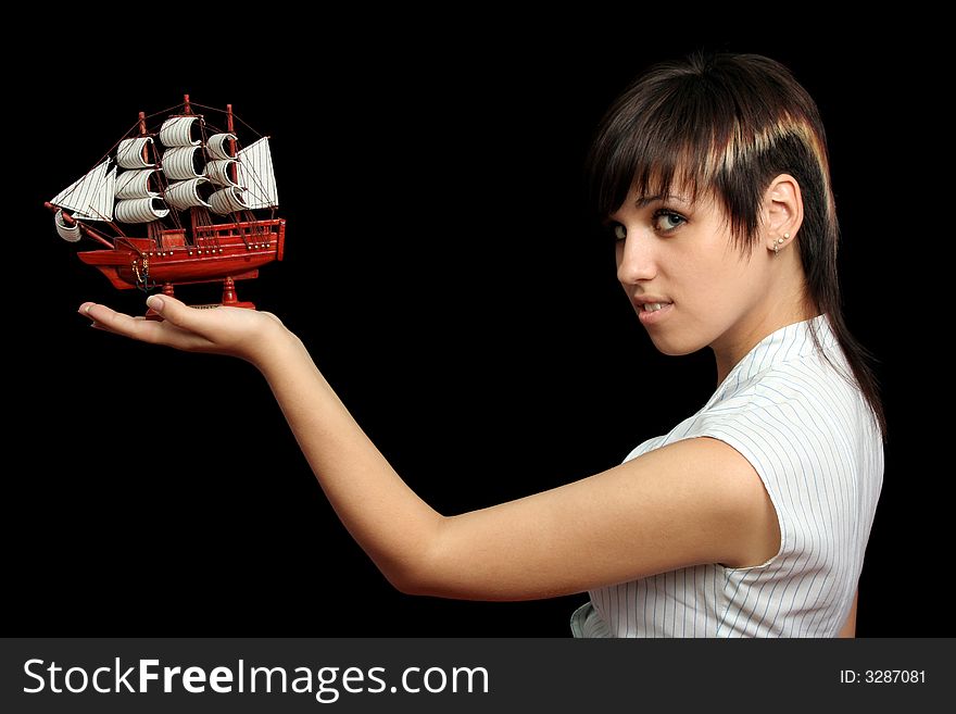 Nice girl with the toy ship