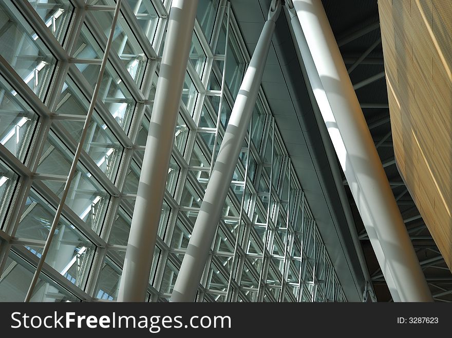 Modern airport building: abstract combination of glass, metal and wood. Modern airport building: abstract combination of glass, metal and wood.