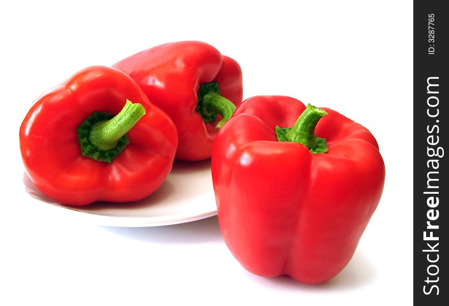 Red pepper on plate isolated