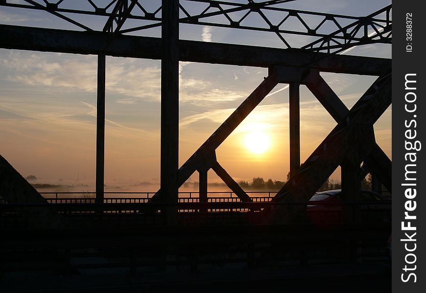 Bridge on Warta river in sun (Konin)