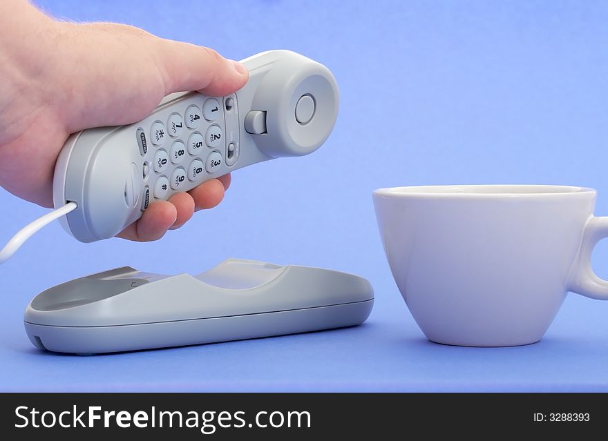 Photo of a telephone over a blue background