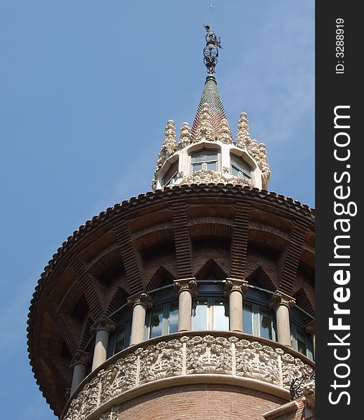 A closeup to a tower of a church in Barcelona