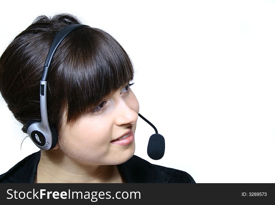 Portrait of beautiful smiling telephone operator with headset