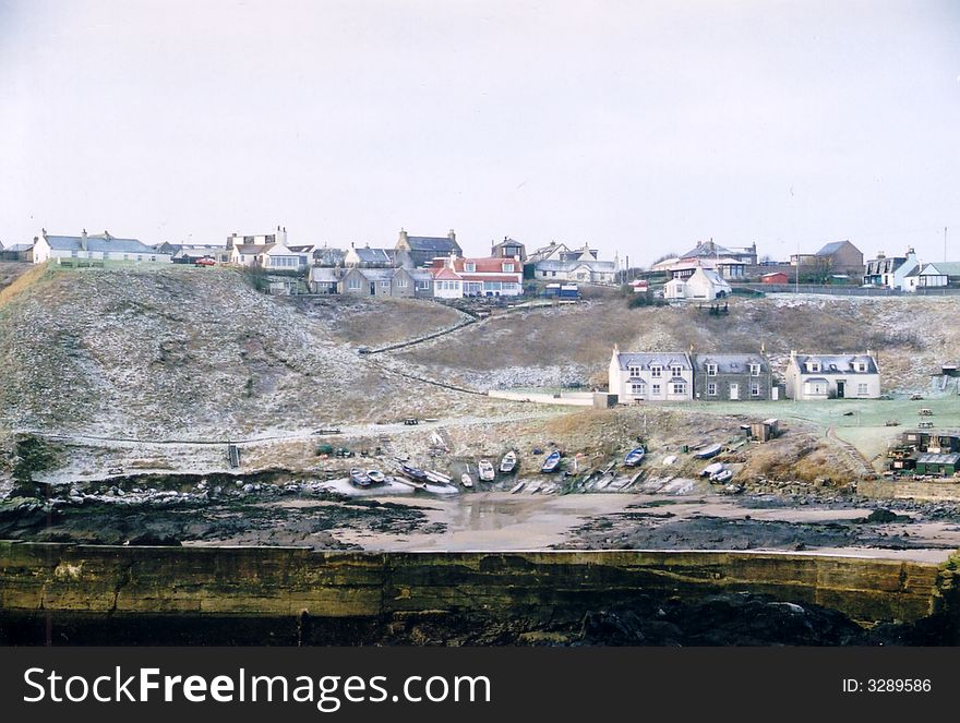 Houses by the sea in Aberdeenshire, Scotland. Houses by the sea in Aberdeenshire, Scotland