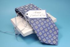 Happy Fathers Day Gift Of A Blue Pattern Check Tie Stock Photo Happy Fathers Day Gift Of A Blue Pattern Check Tie Stock Photo