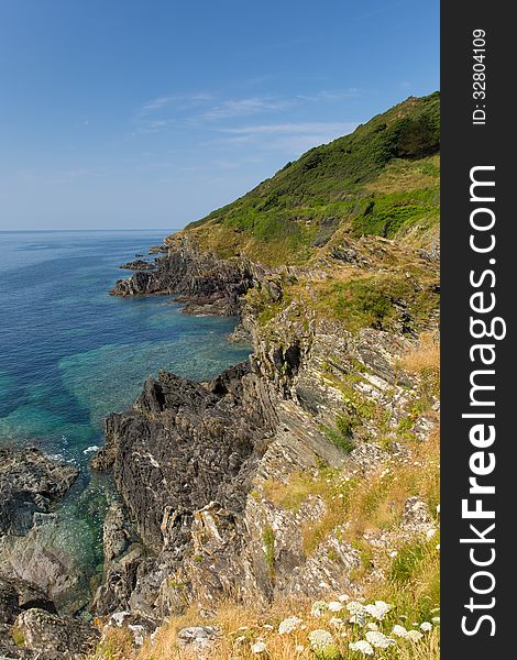 Coastal View From Rocks At Entrance To Polperro Cornwall England