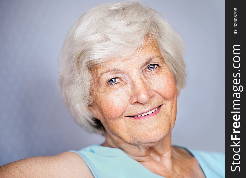 Senior lady looking relaxed at camera. Senior lady looking relaxed at camera