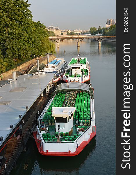 Tourist Boats Waiting For Sightseeing Passengers On The Seine Ri