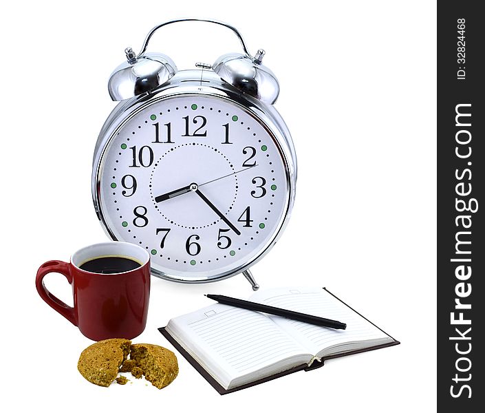 Vintage clock with book, pencil, coffee and cookies isolated. Vintage clock with book, pencil, coffee and cookies isolated