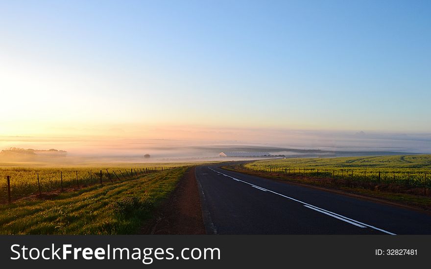 Landscape with country road at sunrise. Landscape with country road at sunrise