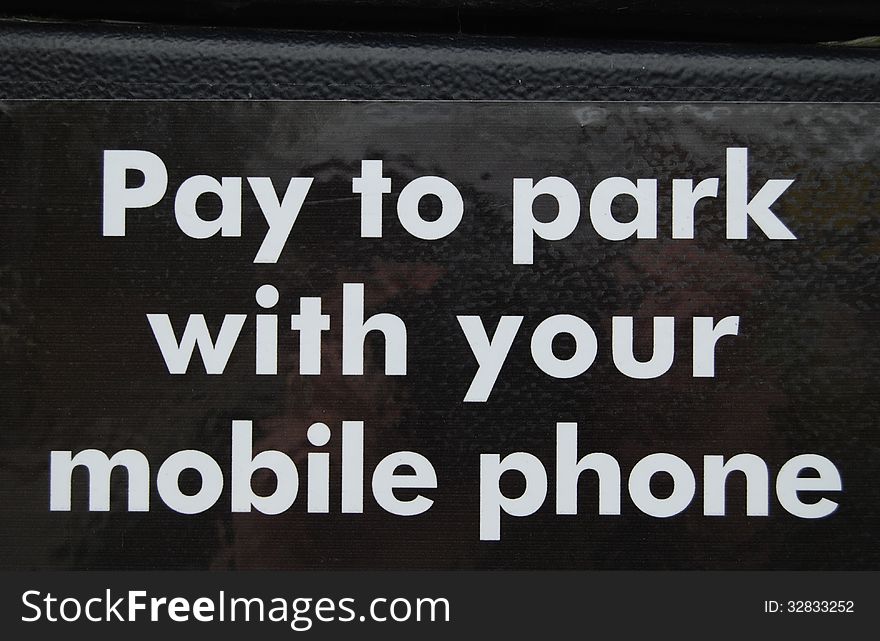 Pay to park sign