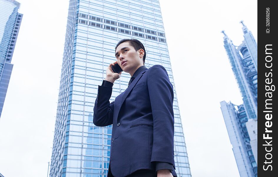 Asian business Man with Smart Phone