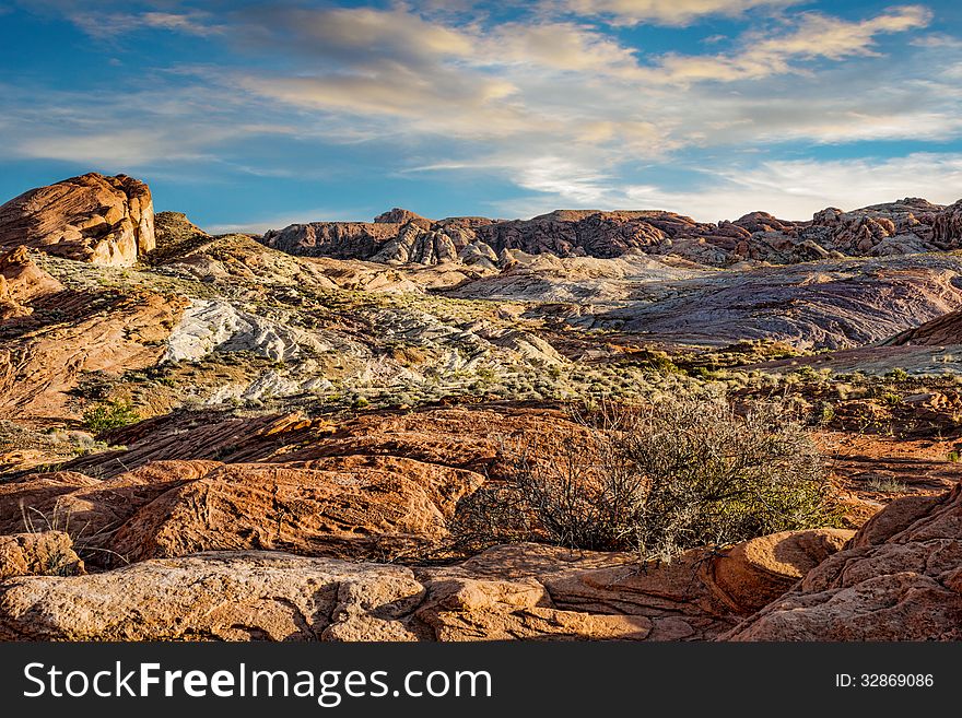 Rocky Landscape In Valley Of Fire With Cloudy Sunset