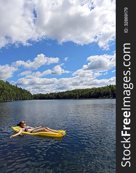 Sunbathing on the lake on a sunny day. Sunbathing on the lake on a sunny day