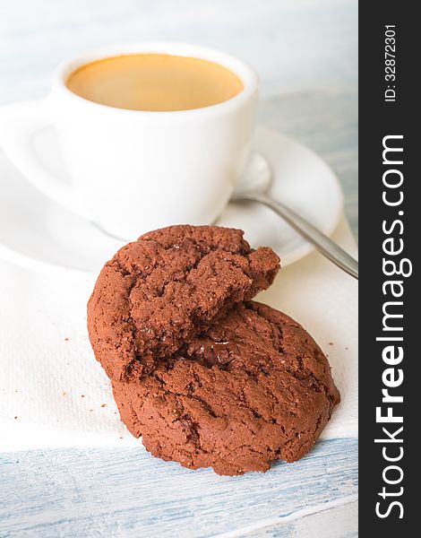 Chocolate cookies and a cup of coffee. Chocolate cookies and a cup of coffee