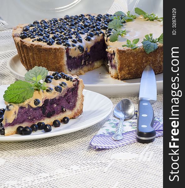 Blueberry Pie With Mint Served With Knife And Spoon