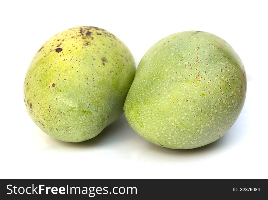 Green mango isolated on a white background